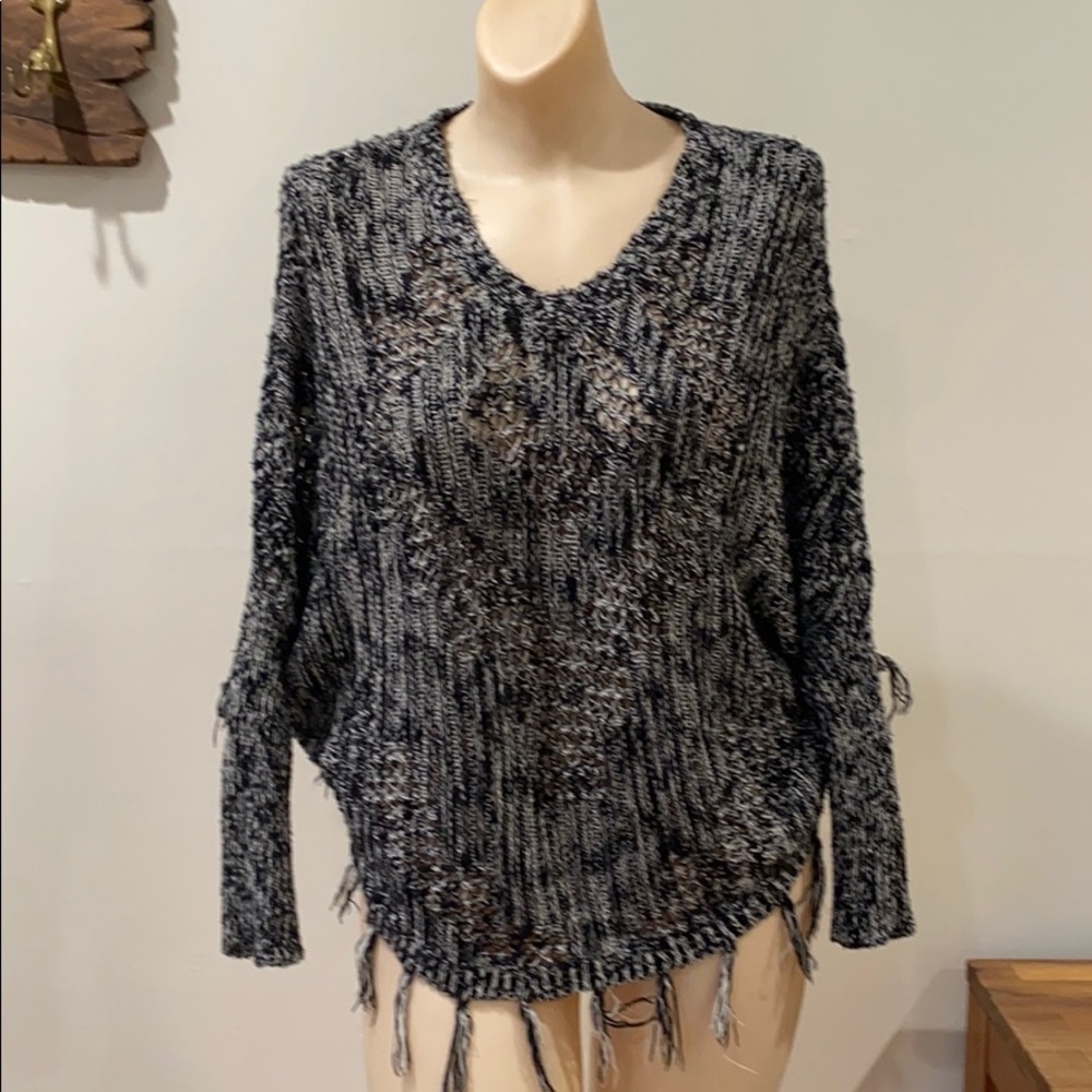 Love on a hanger raw hem pancho sweater black